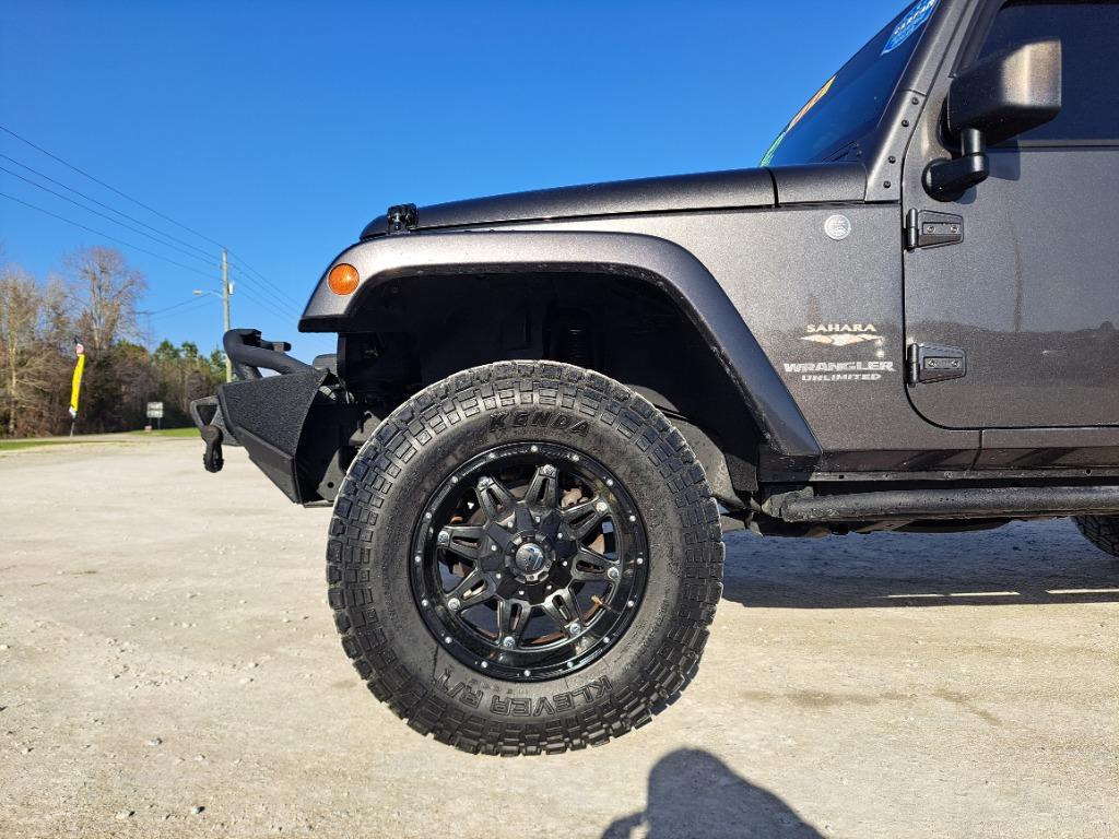 2014 Jeep Wrangler Unlimited Sahara - Photo 9